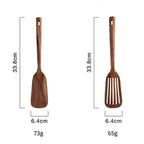 Two wooden spatulas with measurements and weights on a white background