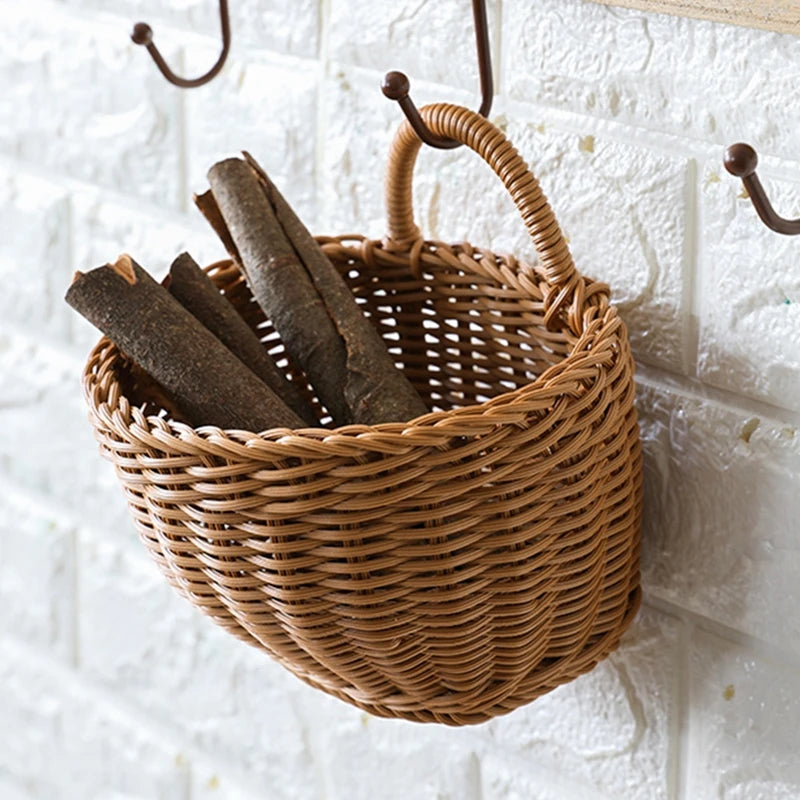 Wicker basket with cinnamon sticks hanging on a textured white wall.