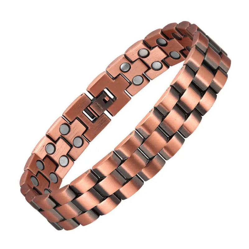 Copper bracelet with embedded magnets on a white background