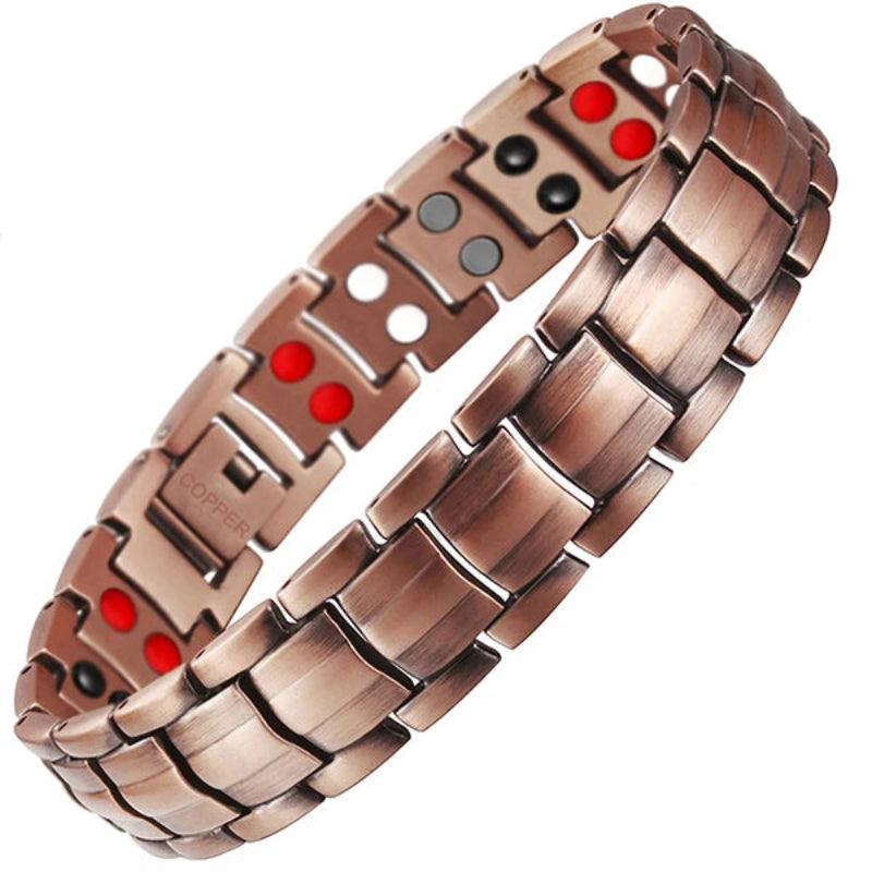 Rose gold bracelet with red and black stones on a white background