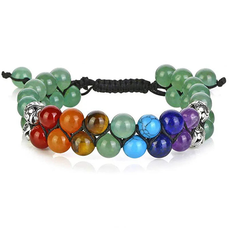 Multicolored beaded bracelet with silver accents on a white background