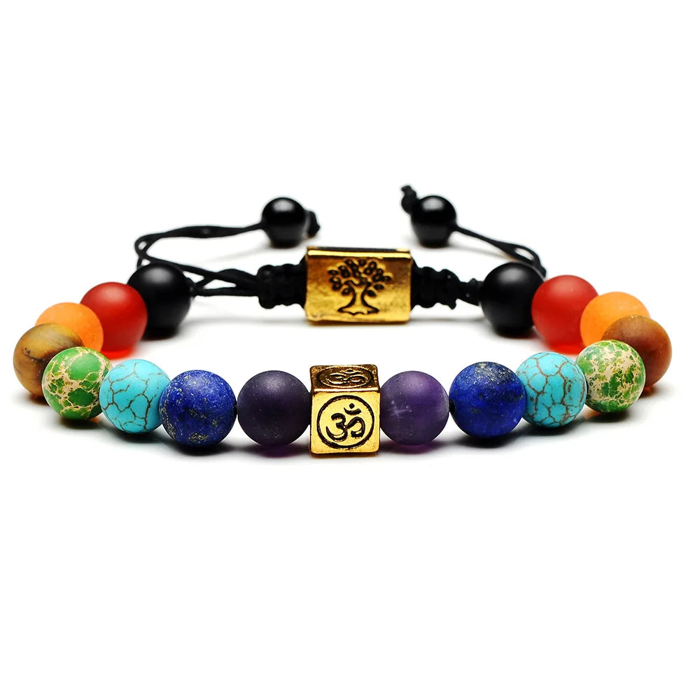 Multicolored beaded bracelets with gold symbols on a white background