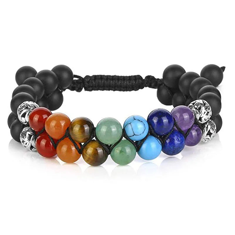 Multicolored beaded bracelet with black cord on a white background