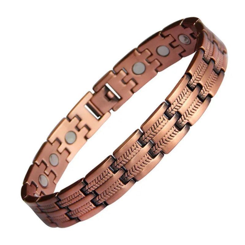 Copper magnetic bracelet on a white background