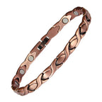 Copper bracelet with magnetic stones on a white background
