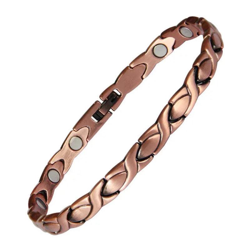 Copper bracelet with magnetic stones on a white background