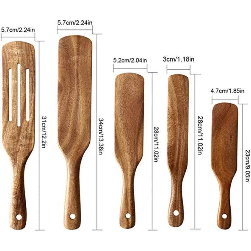 Set of wooden spatulas with measurements on a white background