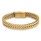 Gold chain bracelet on a white background