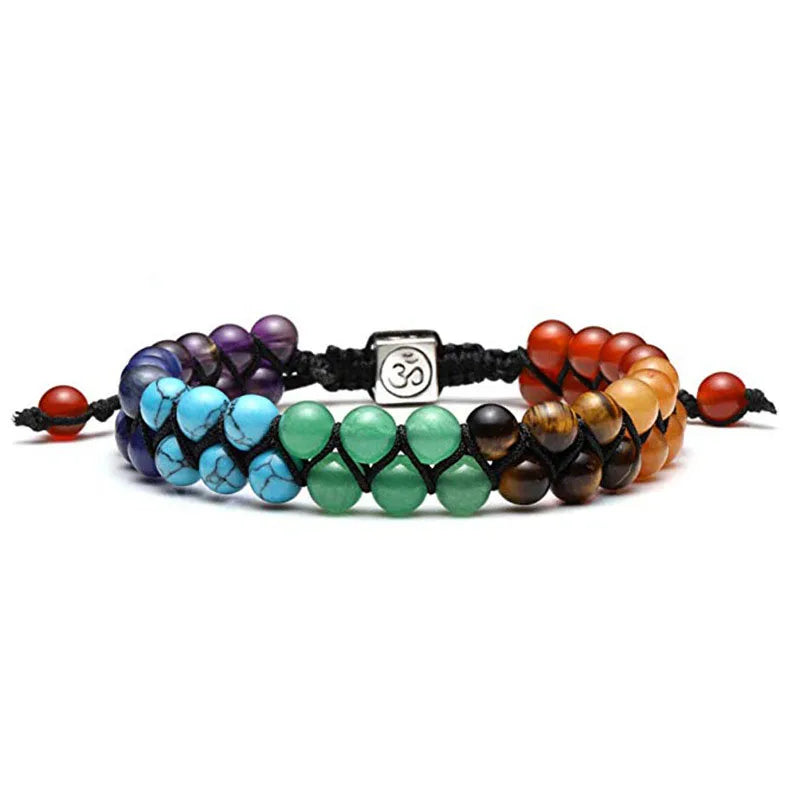Set of four beaded bracelets with different colored beads on a white background
