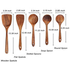 Wooden cooking utensils with measurements on a white background