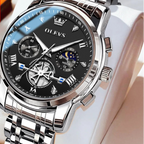 Silver wristwatch with black dial on a white background, featuring the OLEVS brand.