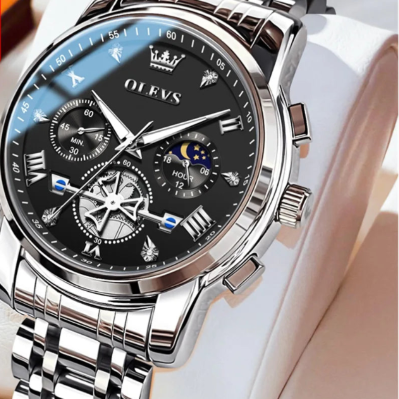 Silver wristwatch with black dial on a white background, featuring the OLEVS brand.