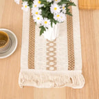 Decorative table runner with floral arrangement on a wooden surface