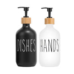 Two soap dispensers labeled 'Dishes' and 'Hands' with black pumps and wooden caps on a white background.