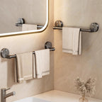 Bathroom setup with towel racks and a mirror