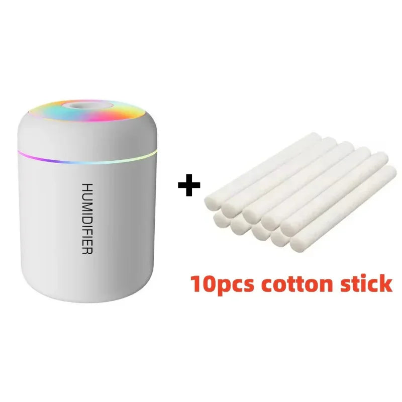 Humidifier with rainbow light effect and 10 cotton sticks on a white background