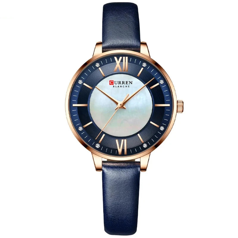 Curren watch with blue strap and rose gold case on white background