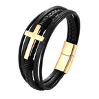 Black braided leather bracelet with gold cross charm and clasp on a white background