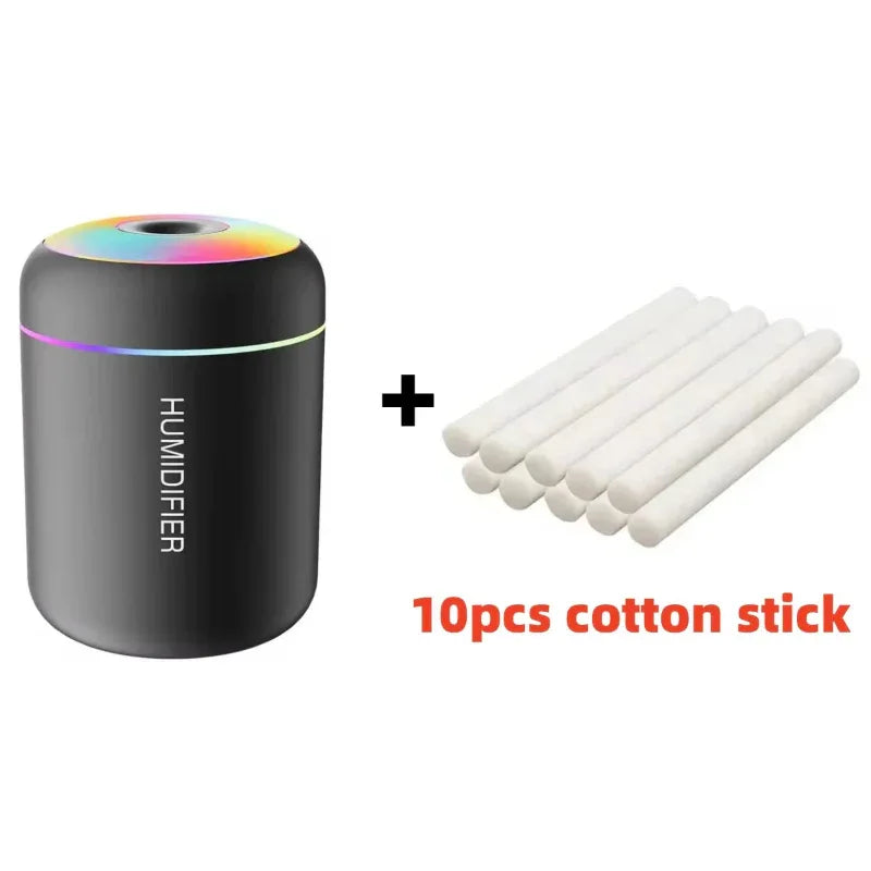 Humidifier with colorful light display and 10 cotton sticks on a white background