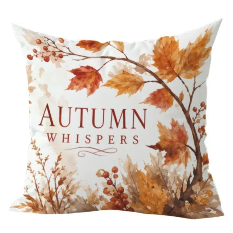 A square throw pillow with an autumn-themed design featuring the text 'AUTUMN WHISPER'S' in dark red serif font, surrounded by watercolor-style orange, brown, and beige leaves and berries on a white background.