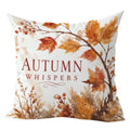 A square throw pillow with an autumn-themed design featuring the text 'AUTUMN WHISPER'S' in dark red serif font, surrounded by watercolor-style orange, brown, and beige leaves and berries on a white background.