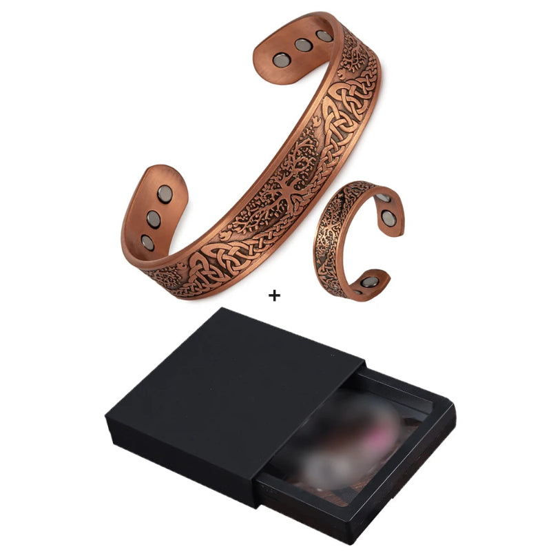 Copper bracelet with intricate designs on a white background