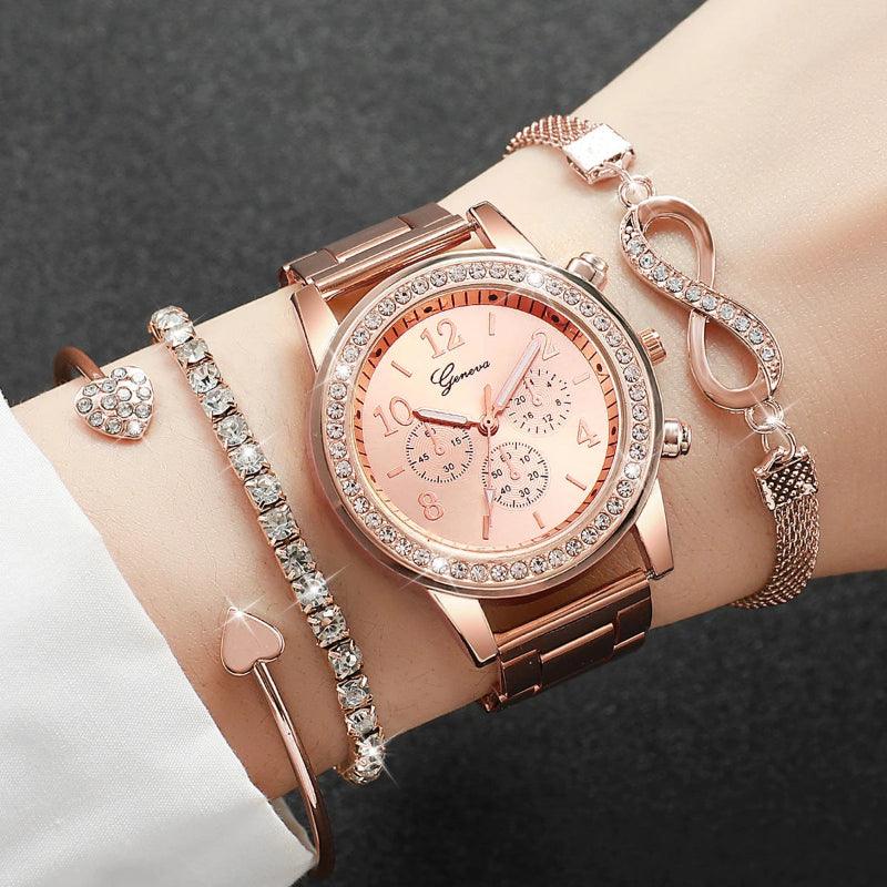 Rose gold watch with multiple bracelets on a wrist against a dark background