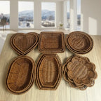 Set of wicker coasters with various shapes on a wooden surface