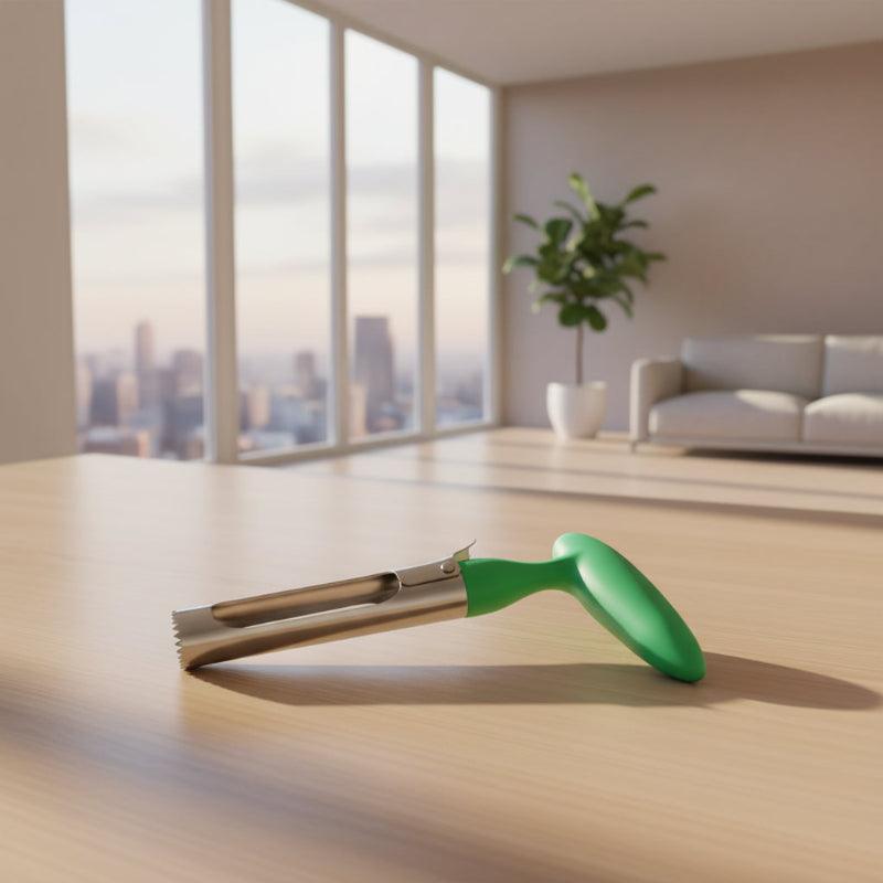 Green-handled metal tool on a white background