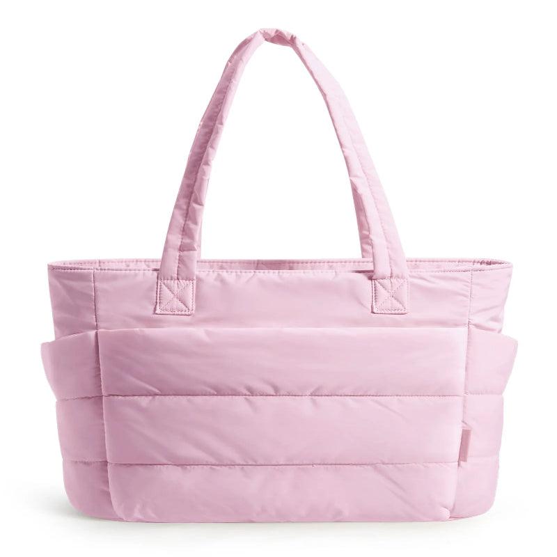 Pink tote bag on a white background