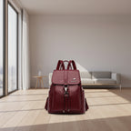 Maroon backpack with a brand logo on a white background