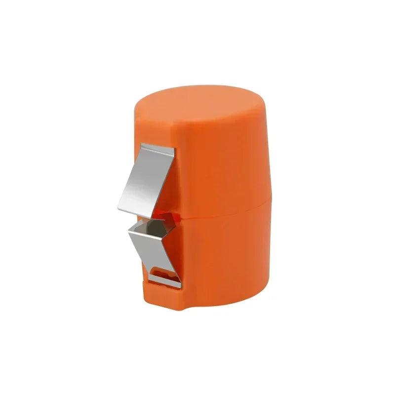 Orange and silver kitchen tool on a white background