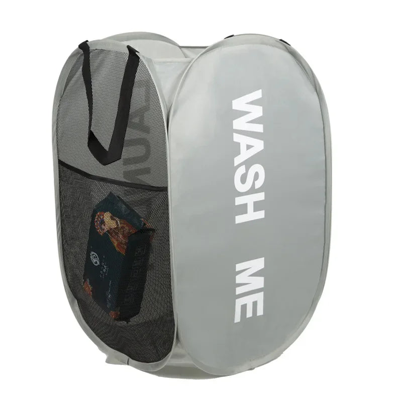 Gray laundry bag with 'WASH ME' text and a black mesh section on a white background