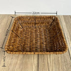 Woven brown basket with dimensions on a wooden surface