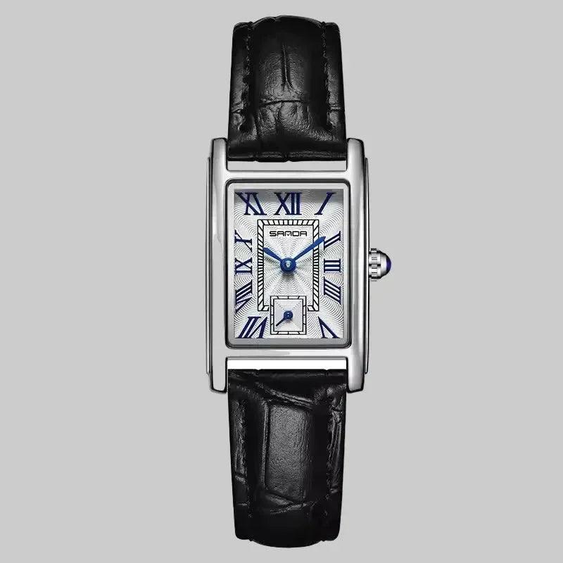 Black wristwatch with silver case and white face on a white background, featuring the brand 'SANDA'.