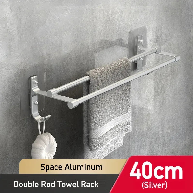 Space aluminum double rod towel rack with a towel hanging on a gray wall.