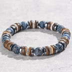 Multicolored beaded bracelet on a light gray background