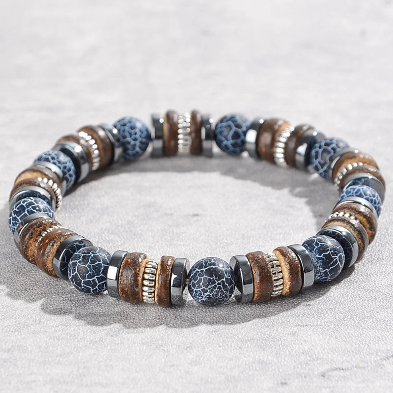 Multicolored beaded bracelet on a light gray background