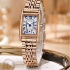 Rose gold watch with a blurred background featuring the brand 'SANDA'.