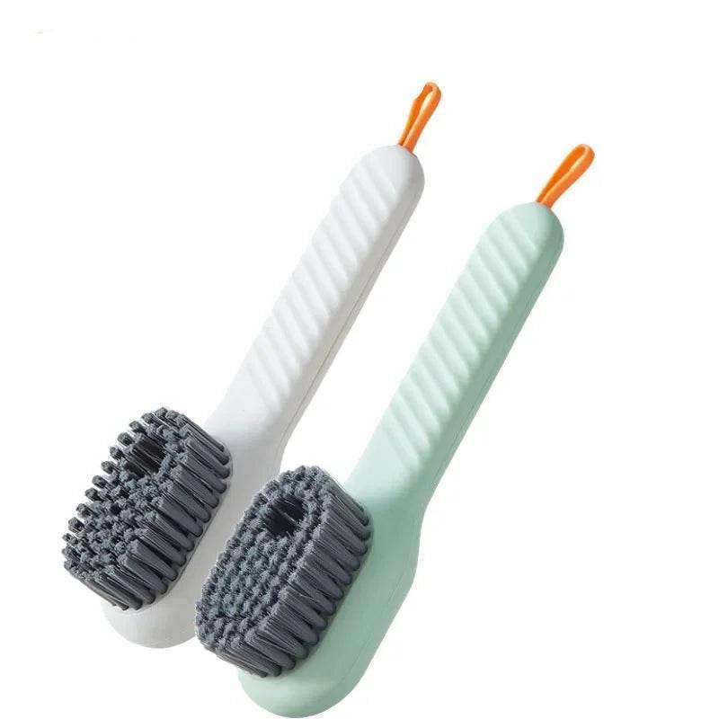 Two cleaning brushes with gray bristles on white background