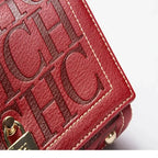 Red handbag with 'CHIC' text on a white background