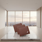 Three brown leather wallets with a brand logo on a white background