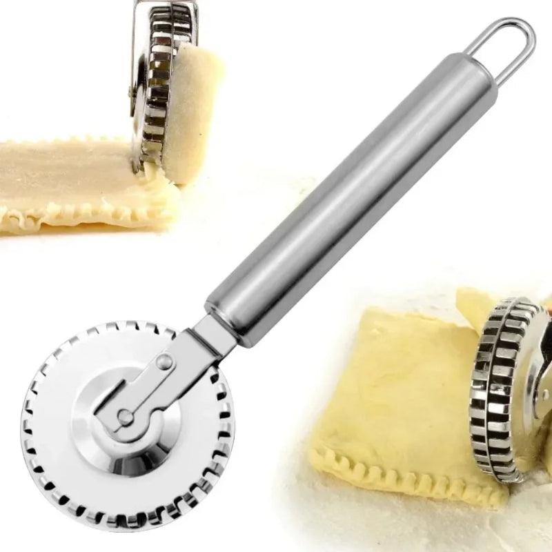 Metal pizza cutter with a yellow cloth on a white background