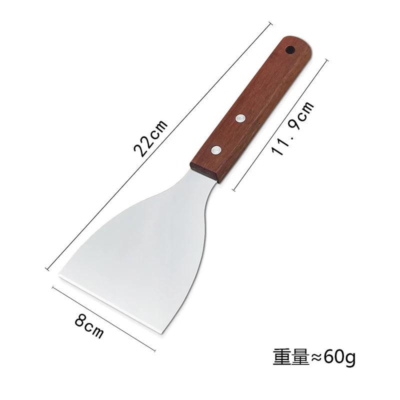 Measuring chart of a spatula with wooden handle on a white background