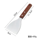 Measuring chart of a spatula with wooden handle on a white background