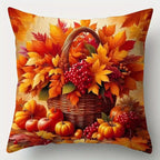 Decorative pillow with autumn design featuring pumpkins, leaves, and a basket on a white background
