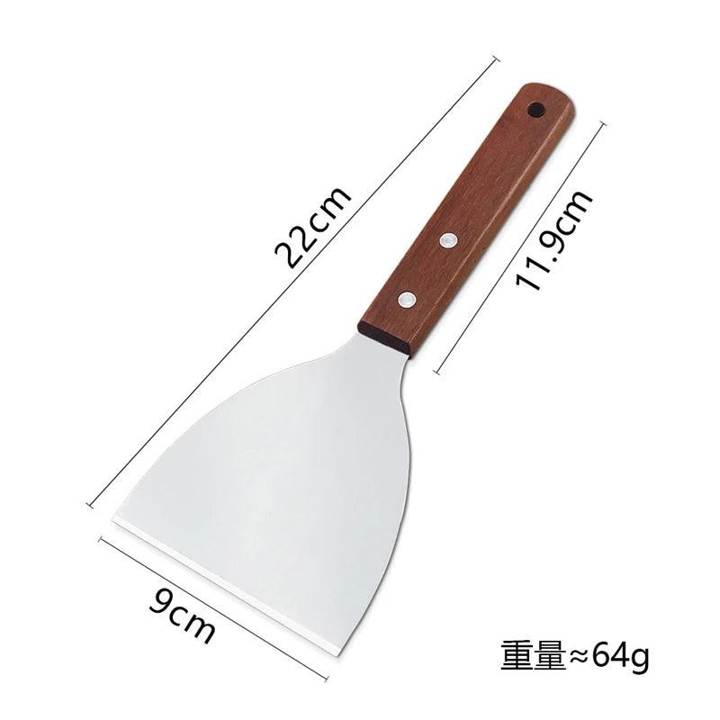 Spatula with wooden handle and metal blade, shown with measurements on a white background.