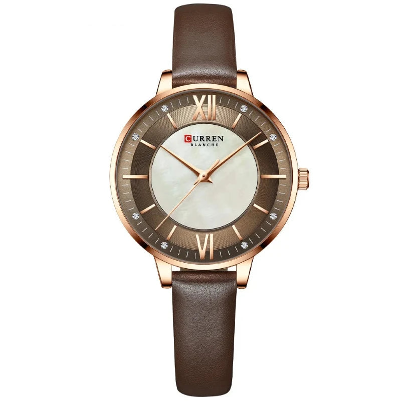 Curren watch with brown leather strap and rose gold casing on a white background