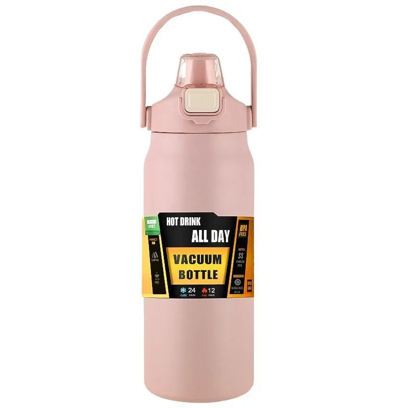 Pink vacuum bottle with handle on a white background