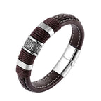 Brown leather bracelet with silver accents on a white background